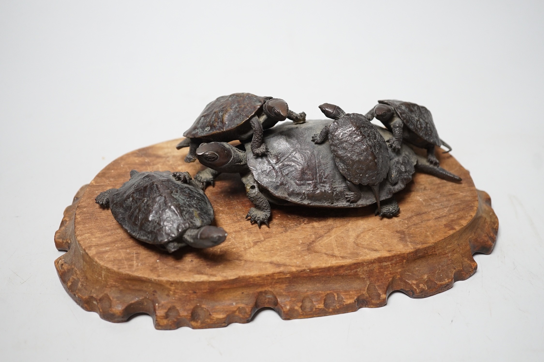 A Japanese Meiji period bronze turtle group, signed to base, (a.f.), 16cm wide